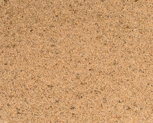 Vue gros plan d'une texture de pierre, gravier et sable fin orange et jaune