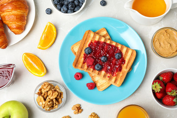 Flat lay composition with tasty breakfast on light grey marble table
