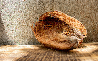 Coconut coir on a wood table - Fiber from the outer husk of the coconut