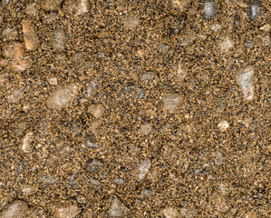 Vue gros plan d'une texture de pierre, gravier et sable fin orange et marron