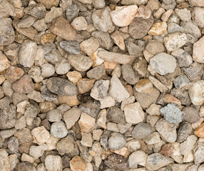 Vue gros plan d'une texture de pierre et rocher gris clair et foncé et multicolore