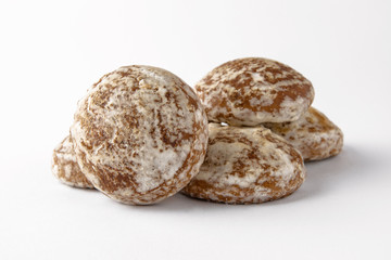 Tasty crunchy cookie: oatmeal, shortbread, chocolate, nutty, honey. Close-up isolated on a white background