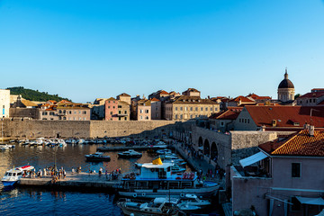 Fototapeta na wymiar View to the old harbor of Dubrovnik on sundown