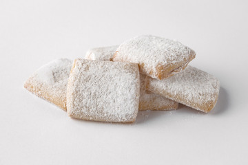 Tasty crunchy cookie: oatmeal, shortbread, chocolate, nutty, honey. Close-up isolated on a white background