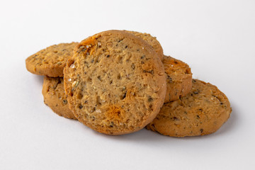 Tasty crunchy salty and spicy cookies: oatmeal, shortbread. Beer snack. Close-up isolated on a white background