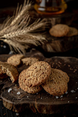 Snack for beer, alcohol. Crispy and crumbly delicious Salty and spicy cookies with seeds, chili peppers, spices and salt. Stylish still life for poster.
