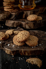 Snack for beer, alcohol. Crispy and crumbly delicious Salty and spicy cookies with seeds, chili peppers, spices and salt. Stylish still life for poster.