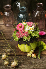 Hollow pumpkin with floral decoration