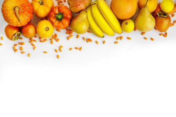Fresh autumn yellow and orange vegetables and fruits isolated on white background, top view. flat lay. autumn background.