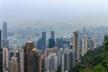 Large Skyline Panorama with Victoria Bay, Transportation Ships, Harbour and Kowloon taken from Hongkong Island. Hong Kong, China