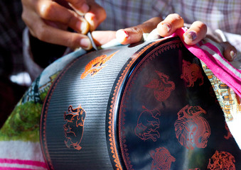 Factory of lacquer in Bagan, Myanmar. Lacquerware includes boxes, tableware, buttons and even...