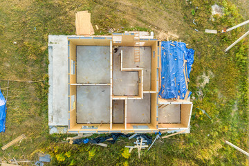 Construction of new and modern modular house. Walls made from composite wooden sip panels with styrofoam insulation inside. Building new frame of energy efficient home concept.