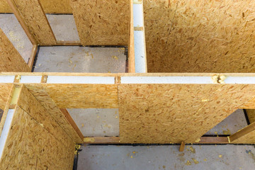 Construction of new and modern modular house. Walls made from composite wooden sip panels with...
