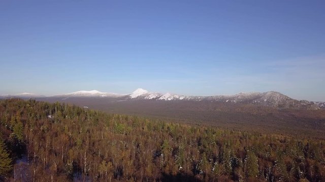 Taganay Mountain Ridge Peak Covered with Snow. Winter in Taganay National Park in the Urals, Russia. Aerial View