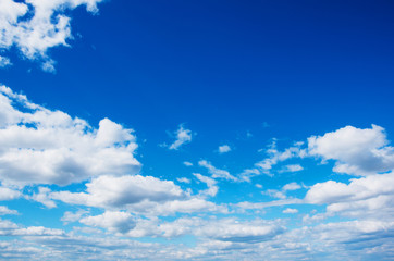 White clouds in blue sky.