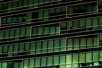 Office building with wide windows on the sunset