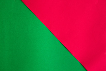 Abstract green paper and red paper background