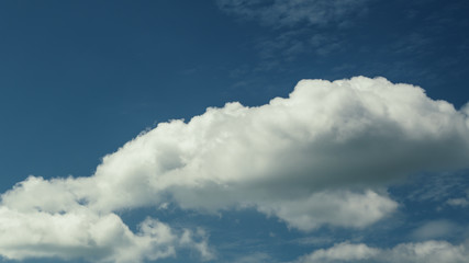 Naklejka na ściany i meble Fluffy Cloud Blue Sky Background