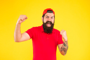 Naklejka premium Lucky day. Total win. Man happy satisfied smiling expression. Man happy face. Happiness concept. Psychological health. Happy emotional guy. Positive emotions. Happy man on yellow background. Winner