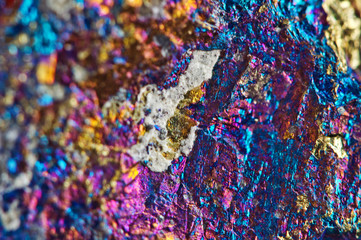 Abstract background. Nugget, colour metal. Beautiful structure. Macro.