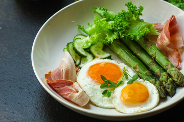 healthy breakfast (fried eggs, bacon, vegetables, asparagus beans, coffee and more) menu concept. food background. copy space. Top view