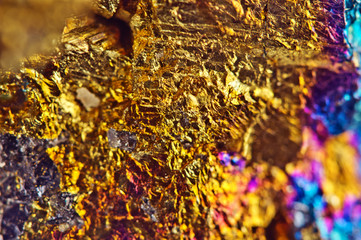 Golden background. Nugget, colour metal. Beautiful structure. Macro