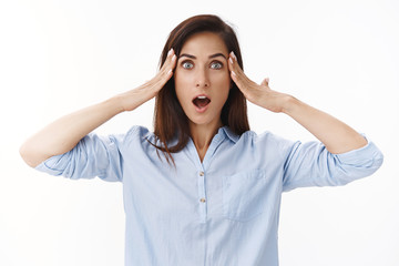 Astonished impressed middle-aged customer realise shocking truth, touch temples, understand everything, open mouth gasping amazed, remember important thing, stand white background ambushed