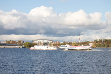 Fototapeta na wymiar River landscape with boats on a sunny day