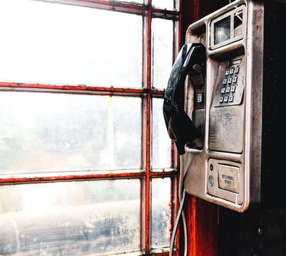 red phone booth dirty old and grimy
