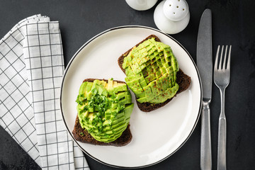 Rye bread and avocado toast. Healthy vegan vegetarian breakfast meal, lunch or snack
