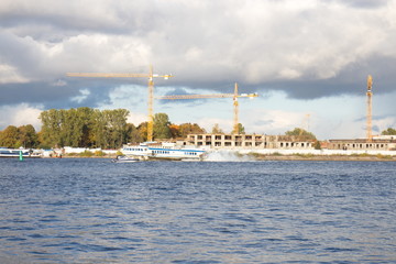 Naklejka premium River landscape with boats on a sunny day