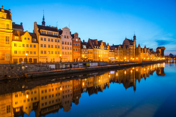 Gdansk at night with reflection in Motlawa river, Poland