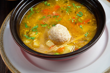 Soup with meatballs . catering menu