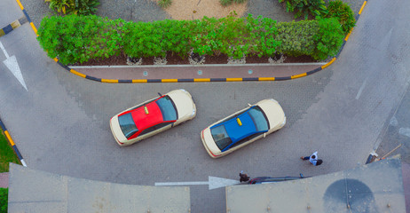 taxi cars waiting in front of hotel. aerial view