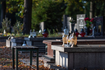 Autumn alley at the cemetery before the All Saints Day - obrazy, fototapety, plakaty