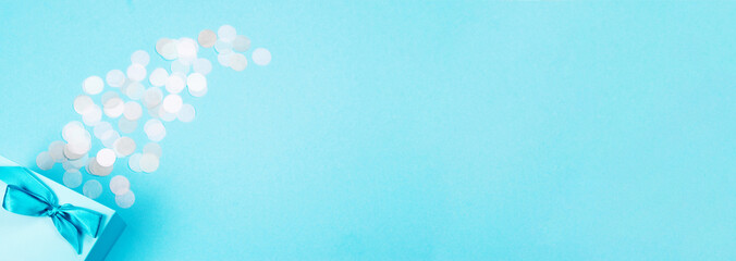 Blue box with pastel confetti.