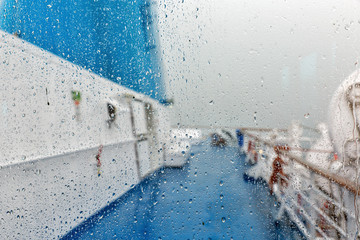 Ferry ship deck under heavy rain
