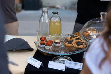 Delicious finger food deserts sold at outdoor market place.