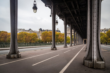 Bir Hakeim bridge near the Eiffel Tower and the Ile aux Cygnes in Paris France on an autumn day