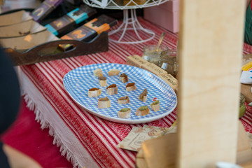 Delicious finger food deserts sold at outdoor market place.