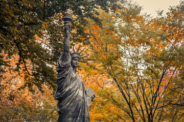 Statue of Liberty replica in Luxembourg Gardens, Jardin du Luxembourg in Paris France, on an Autumn day, Paris in the Fall © JeanLuc Ichard