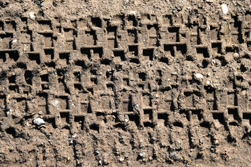 Trail bike tyre tread in soft ground
