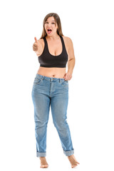 Young body positive woman showing thumb-up on white background