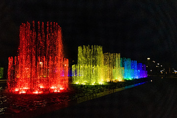 fountain at night colors of the rainbow. LGBT fountain