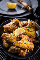 Spicy chicken wings with garlic and lemon marinade