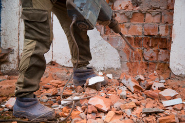 Jackhammer. The use of a jackhammer in construction works.