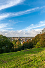 Fototapeta na wymiar Tall view of Richmond, North Yorkshire and the castle with blue skies and autumn colors