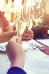two glasses of tasty white wine at a restaurant