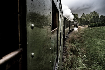 Old steam strain with a cloud of steam