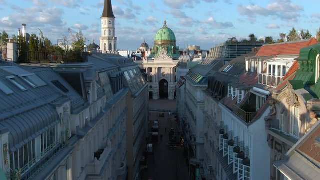 Vienna, Austria, aerial jib shot of Vienna cityscape showing heritage buildings in the Historic Centre by day in autumn season.